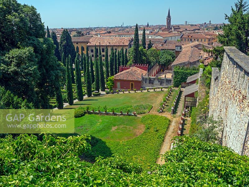 Looking down on layout of the garden with view to city beyond 