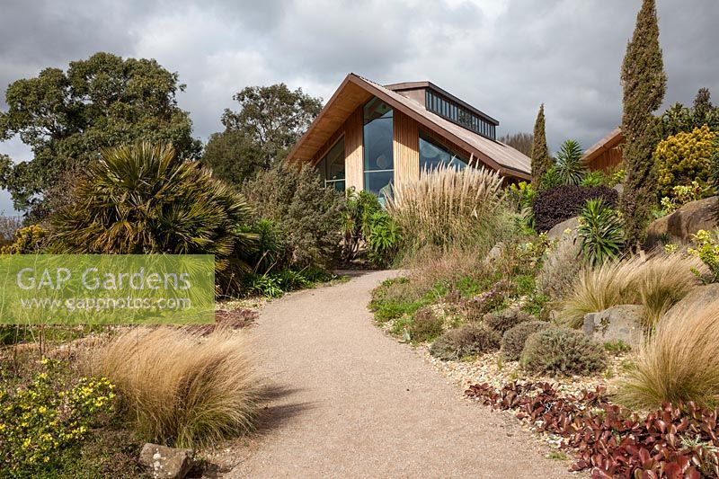 The Dry Garden at RHS Hyde Hall, showing the new educational centre building