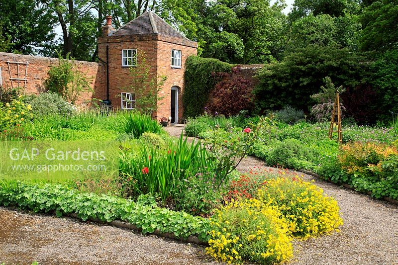 Brick folly built into the wall of the walled garden at Middleton Hall garden.