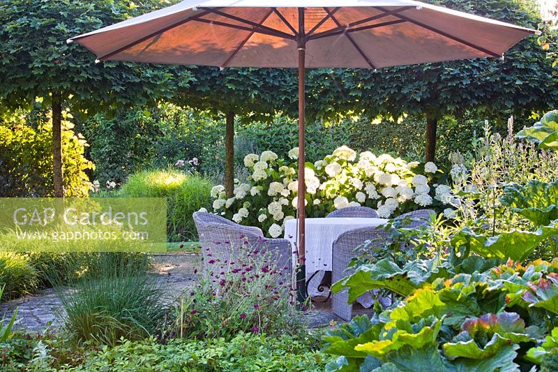 Relaxing seating area with parasol