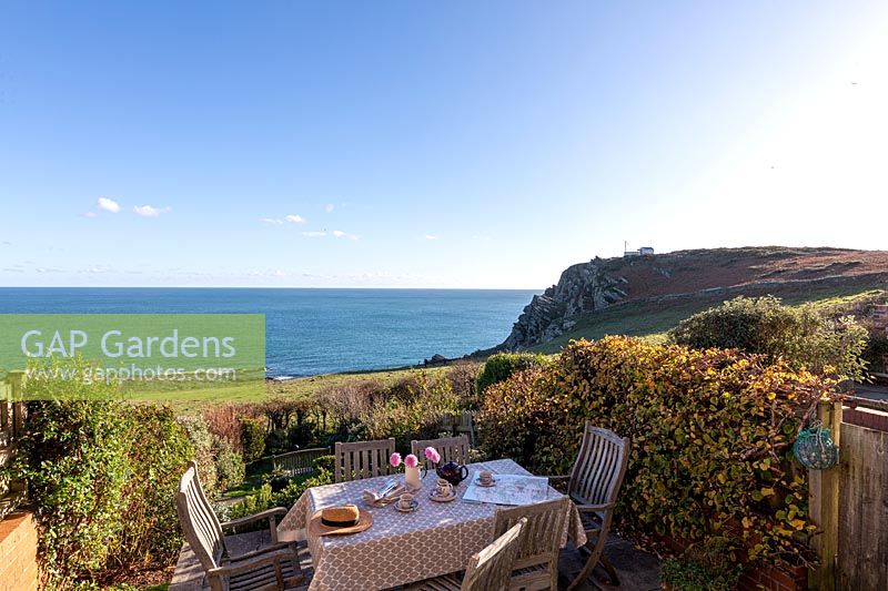 Outdoor garden table and chairs with fabulous view of the sea at Prawle Point, East Prawle, Devon