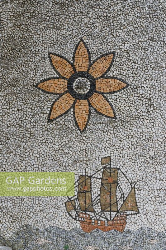 Detail of mosaic of sailing boat and flower in wall of Fonte Nascente - Fountain of the Source. Seixal, near Setubal, Portugal. September