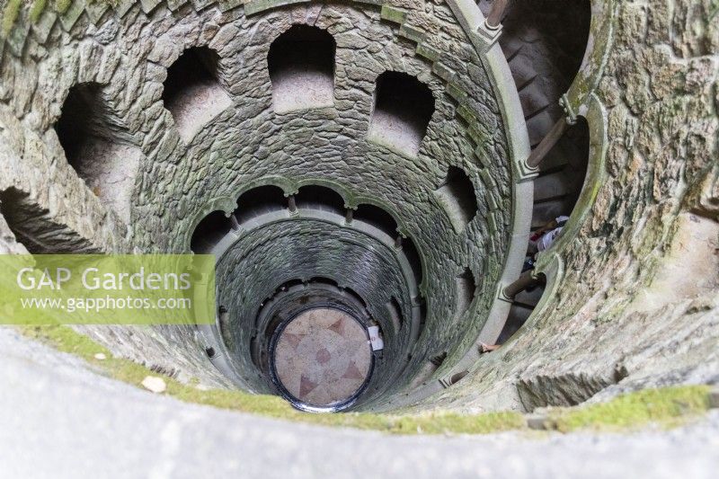 Arches of the spiral staircase of The Initiation Well, Sintra, near Lisbon, Portugal, September. 