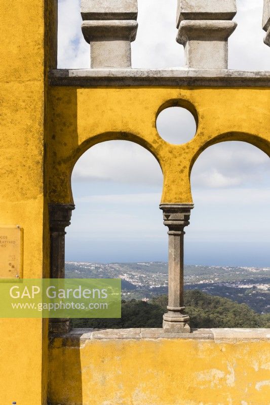 View over the park through arch of the palace. Parque da Pena, Sintra, near Lisbon, Portugal, September.