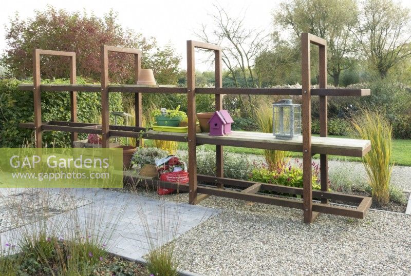 Corten steel garden shelving and Panicum virgatum.