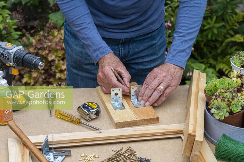 Step-by-Step Making a Succulent Picture. Step 4: on the short sides, mark a central position for side brackets to support inner dividers