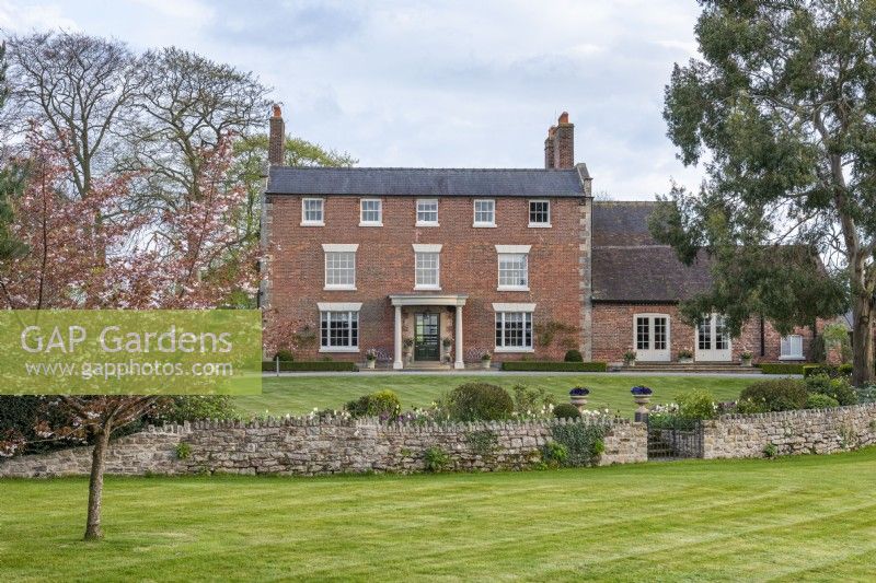 Seventeenth century brick house overlooking the surrounding Shropshire countryside.