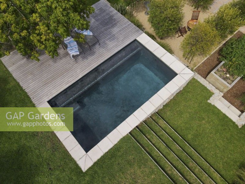 Aerial/Bird's eye view of swimming pool, deck and grassed terraces