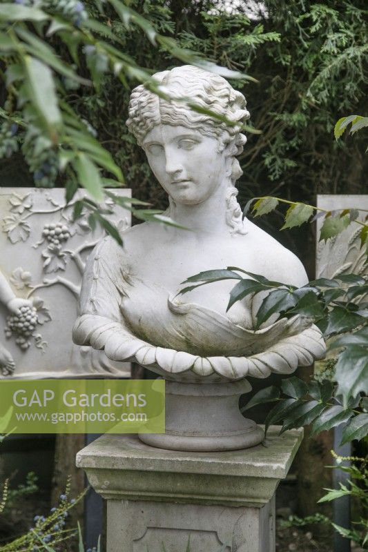 Classical busts at Hamilton House garden in May 