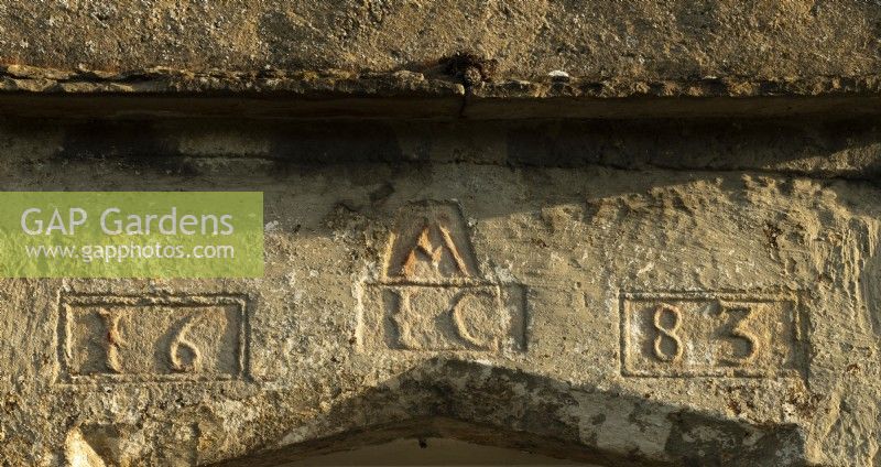 A stone carving over the front door showing the date the White House was built. 