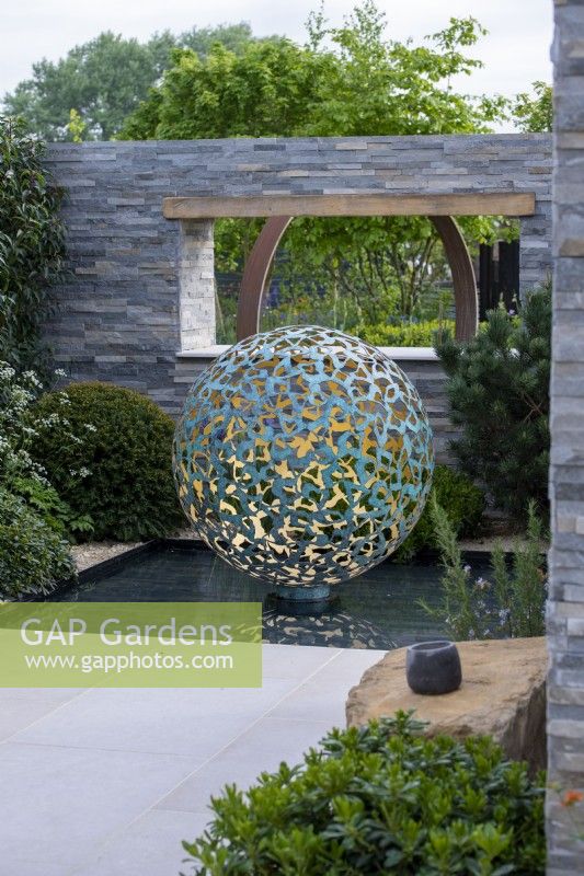 Geminus Sculpture by David Harber, set over a water rill - A Peaceful Escape, RHS Malvern Spring Festival 2022
