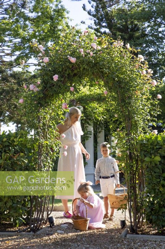 Gardener with her children