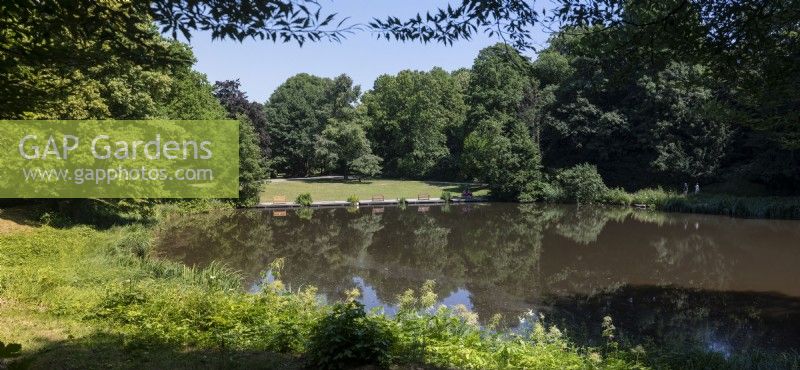 Essen North Rhine-Westphalia - Nordrhein-Westfalen Germany
General view over the park on a summers day with blue skies. View over the Margarethensee Lake. Stitched panorama