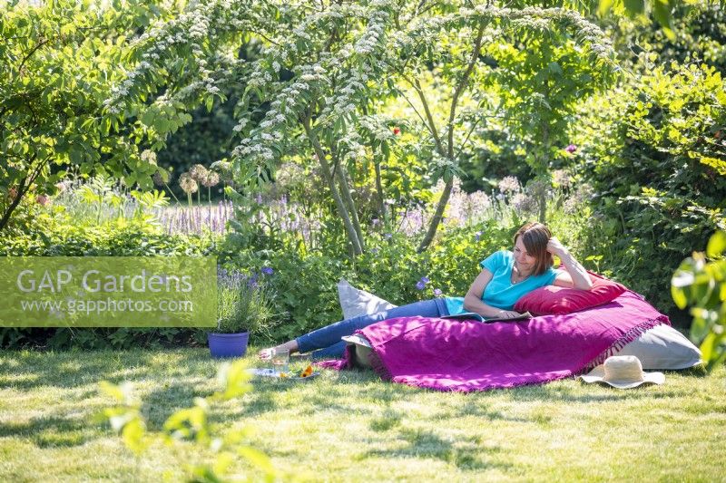 Woman relaxing on large bean bag