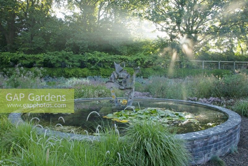 View of the circular pond in the Dragon Garden