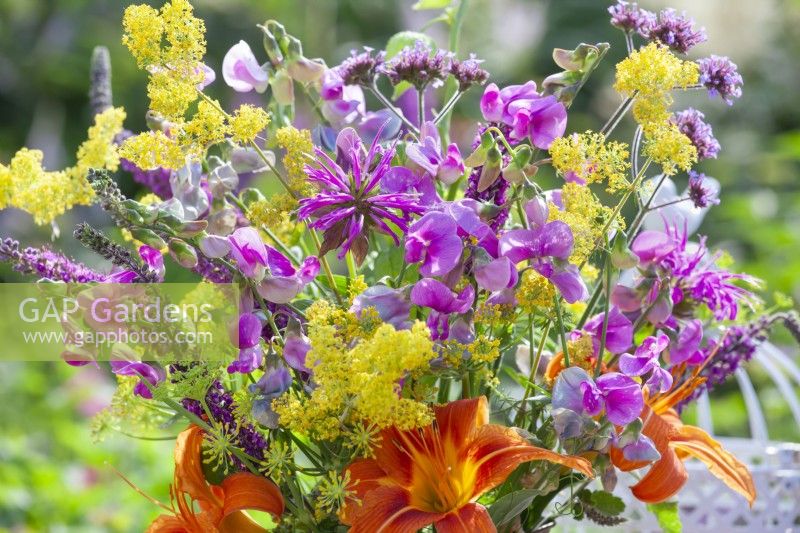 Summer bouquet containing Monarda, Sweet pea, Hemerocallis, Verbena bonariensis, Fennel and Galium verum.