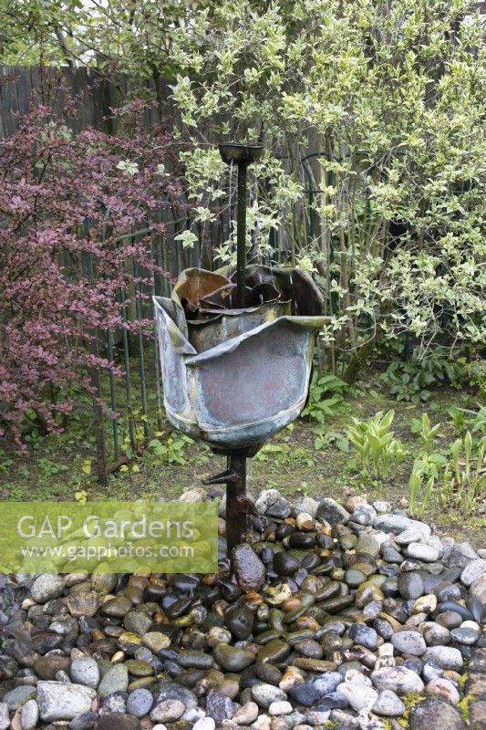 Recycled water feature in the Reclaimed Garden at Barnsdale Gardens, April