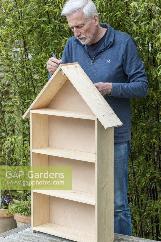 Step-by-Step Making a Plant Theatre. Step 19: Anthony Wagstaff gives the unit three coats of wood preservative, paying particular attention to any sawn edges, especially on the plywood.