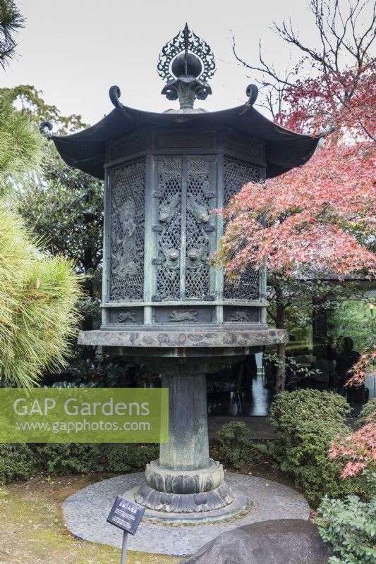 Octagonal metal ornate lantern.