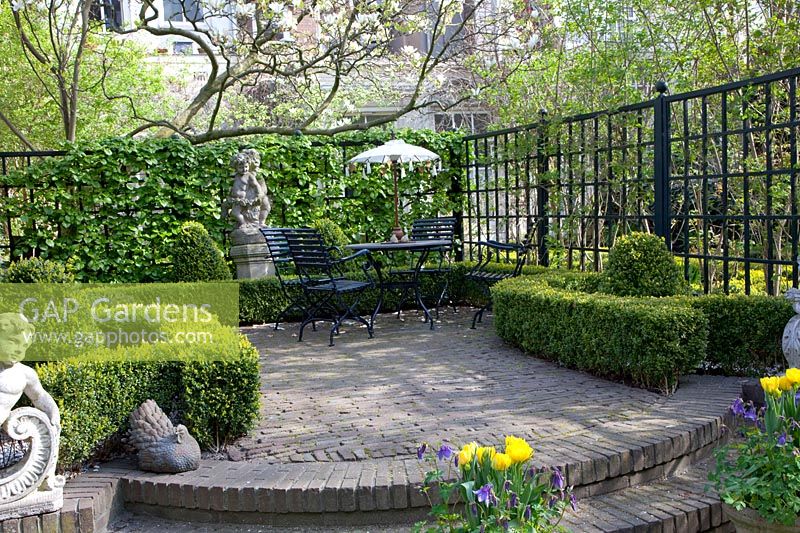 Formal small garden with terrace 