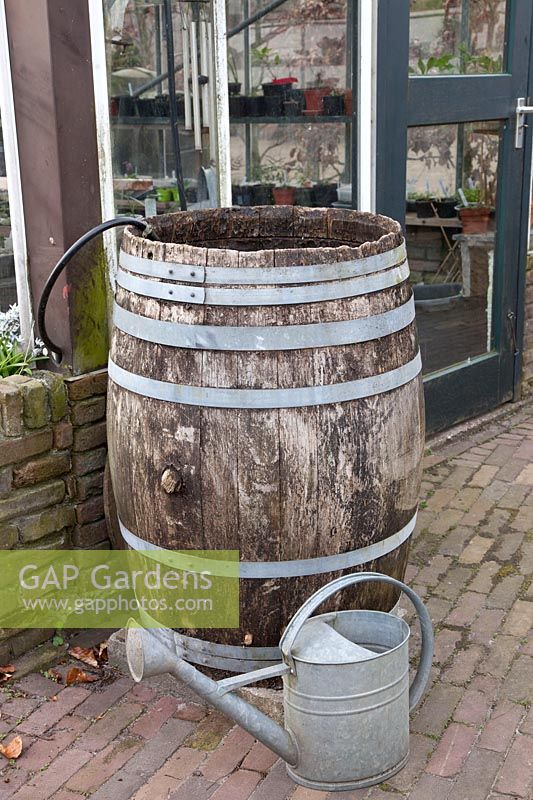 Water barrel and watering can 