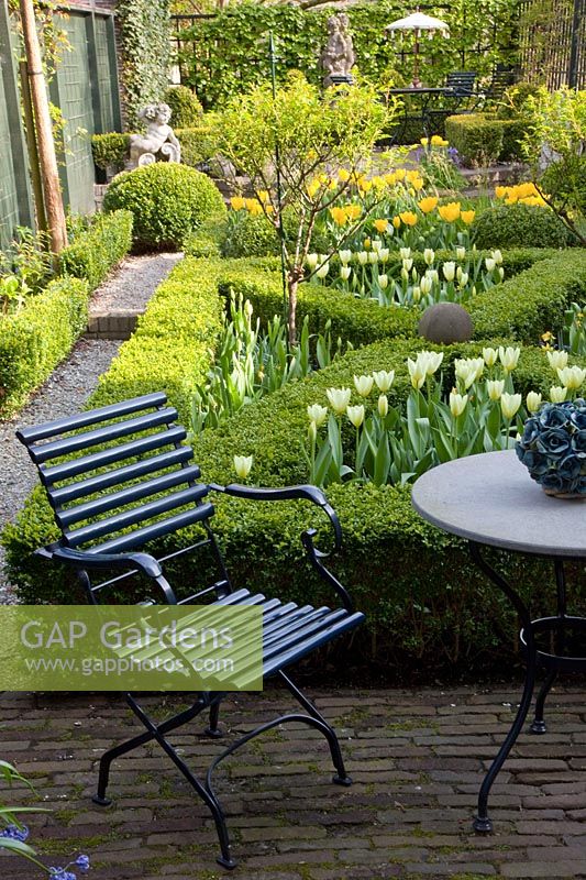 Seating area in formal garden 