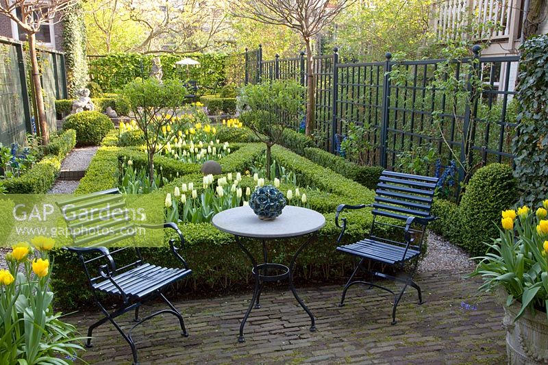 Formal, small garden with terrace 