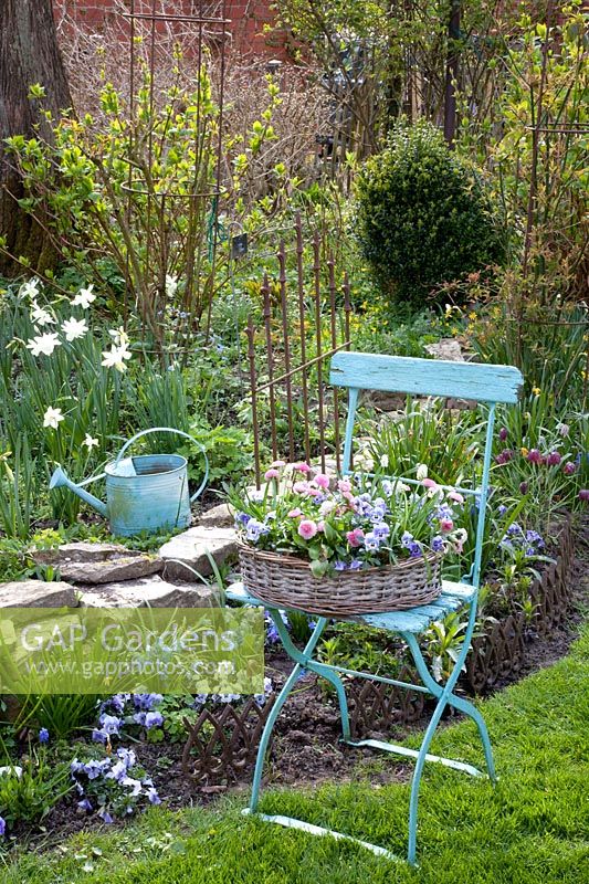 Chair with planted wicker basket 