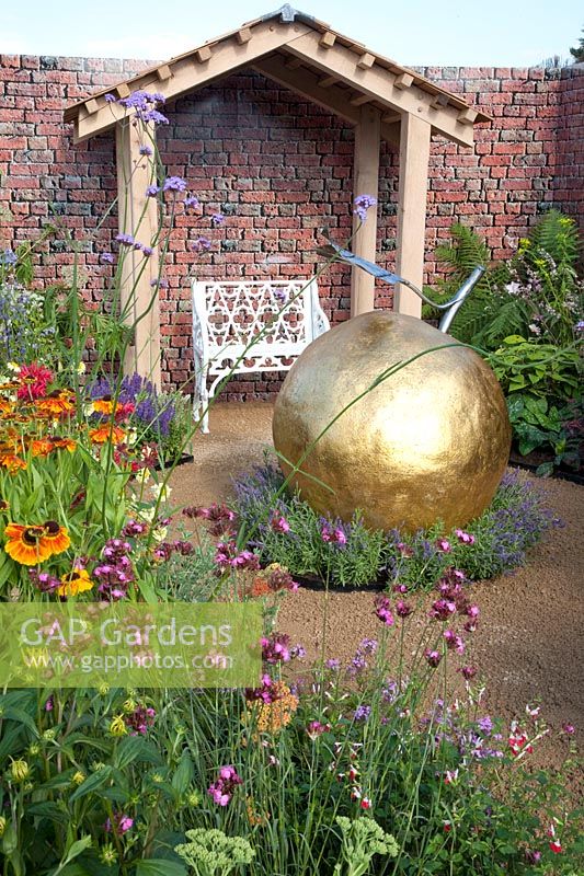 Garden with golden apple as an art object 