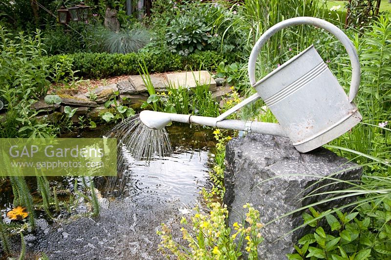 Watering can as a water feature 