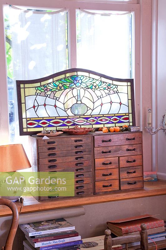 Antique furniture and stained glass windows 