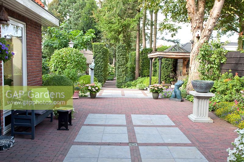 View of the garden, paving made of Chinese hard stone and brick 