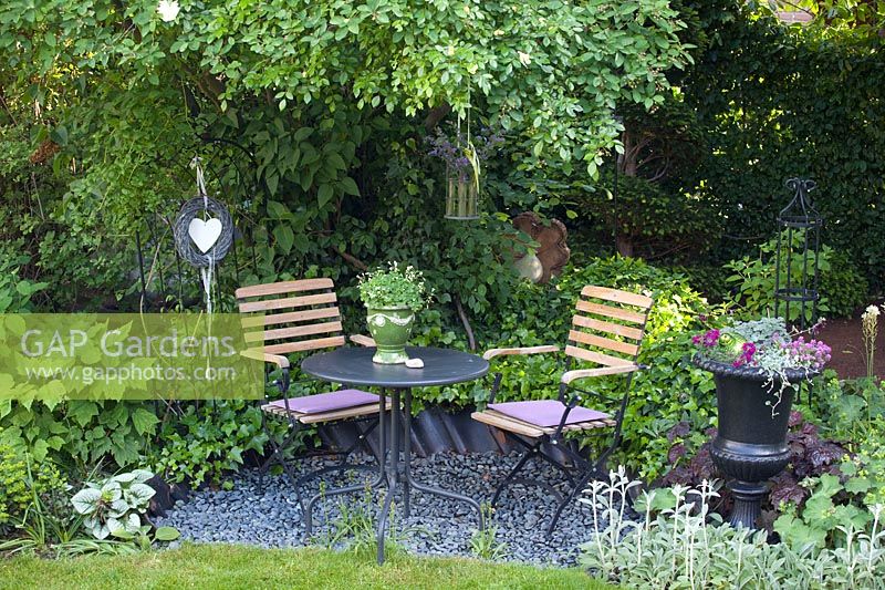 Seating area in small garden 