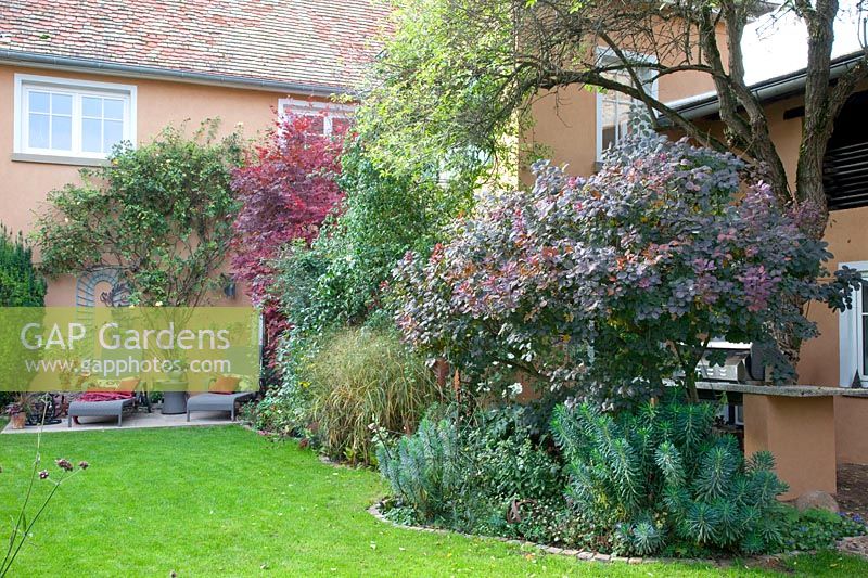 Country house garden in autumn 