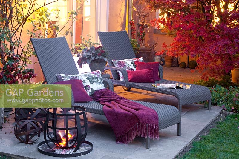 Terrace in autumn with fire basket 