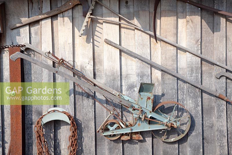 Old garden tools on the wall 