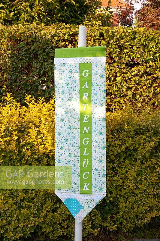 Self-sewn garden flag made of fabric 