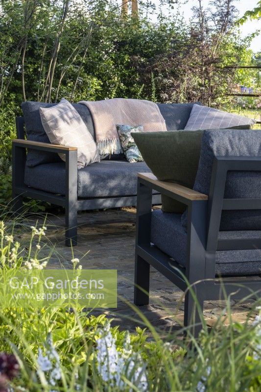 Seating area on The Cotswold Garden - designer Mark Draper Graduate Gardeners - RHS Malvern Spring Festival 2024