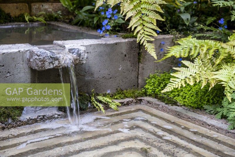 Water flowing to a stepped, rectangular pool on The Ecotherapy Garden: Designed by Tom Bannister