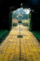 Garden gate to rose garden at Ashridge College in Hertfordshire
