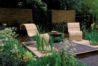 Contemporary furniture on decking in 'The environmentally Responsible Garden' Chelsea FS 2004
