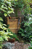 Compost bin made of recycled wooden pallets 