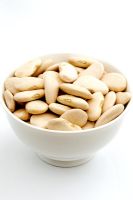 Bowl of dried butter beans - Phaseolus lunatus