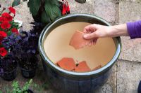 Adding crocks to bottom of glazed pot