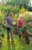 Man and woman going gardening