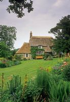 Thatched cottage and bench with views over gardens - Ansty Cove, Ivy Cottage, Dorset