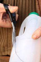 Making a scoop out of a recycled milk carton 