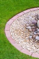 Lawn with brick edging, gravel and pebbles - Nailsea, Somerset, UK 