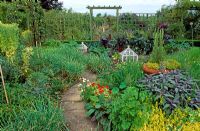 Potager view with herbs in centre