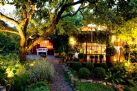 Seating area in garden with lighting
